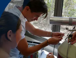 A trainee using a nuclear measurement device during a nuclear measurement lesson 